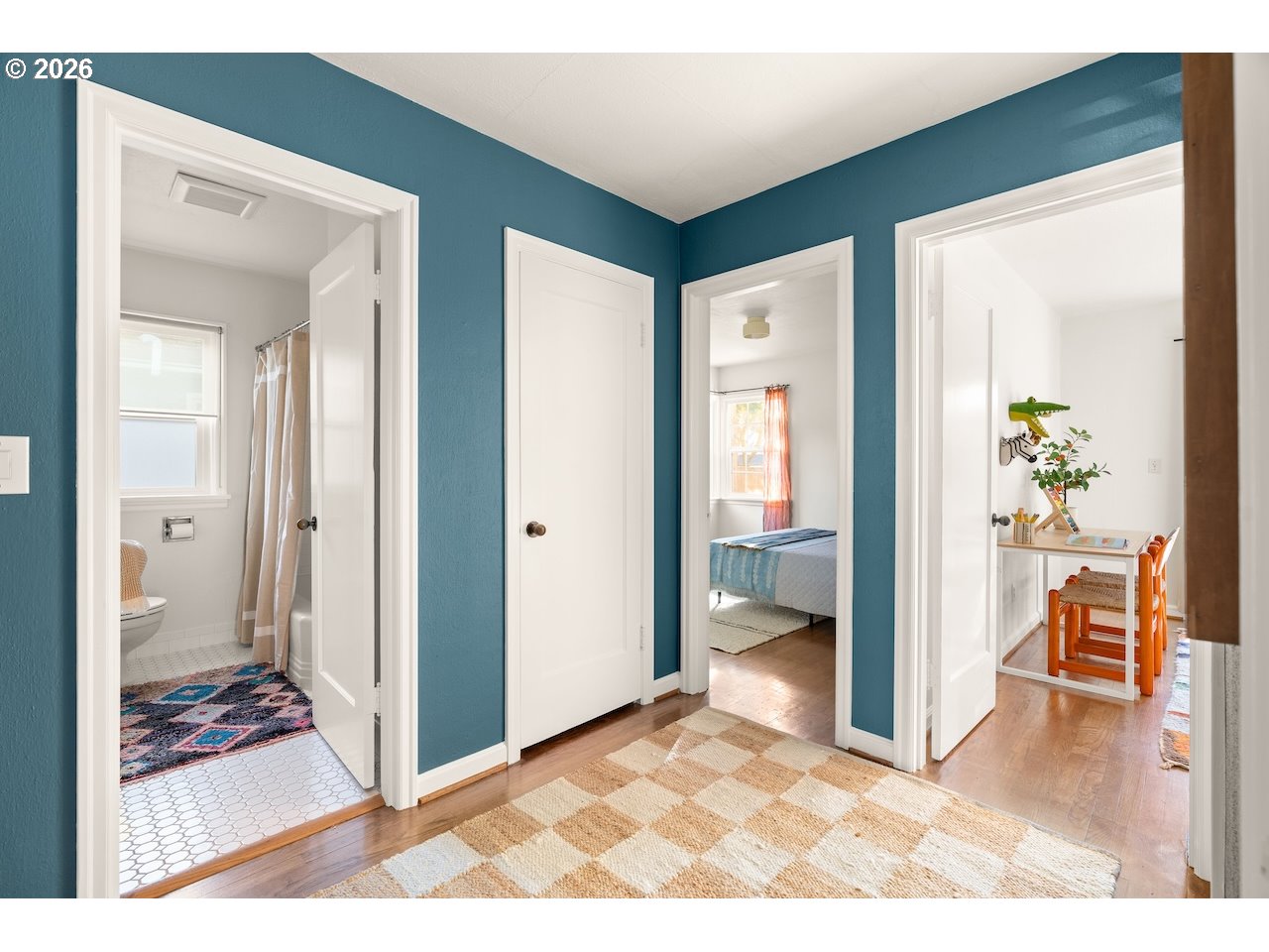 1606 North Alberta Street Portland, OR 97217 - Photo 16 of 46 a view of a hallway and wooden floor and a livingroom