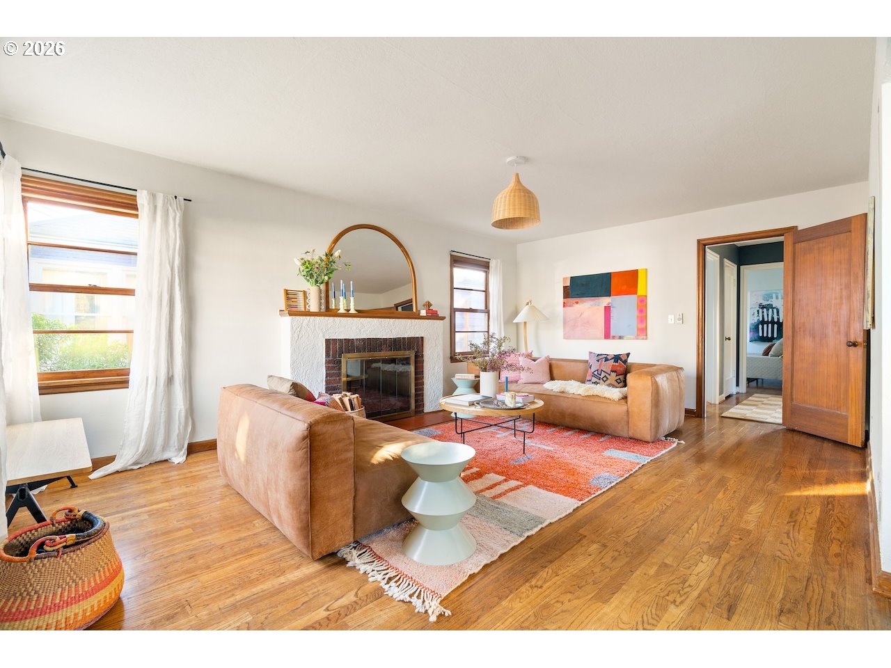 1606 North Alberta Street Portland, OR 97217 - Photo 2 of 46 a living room with furniture and a fireplace