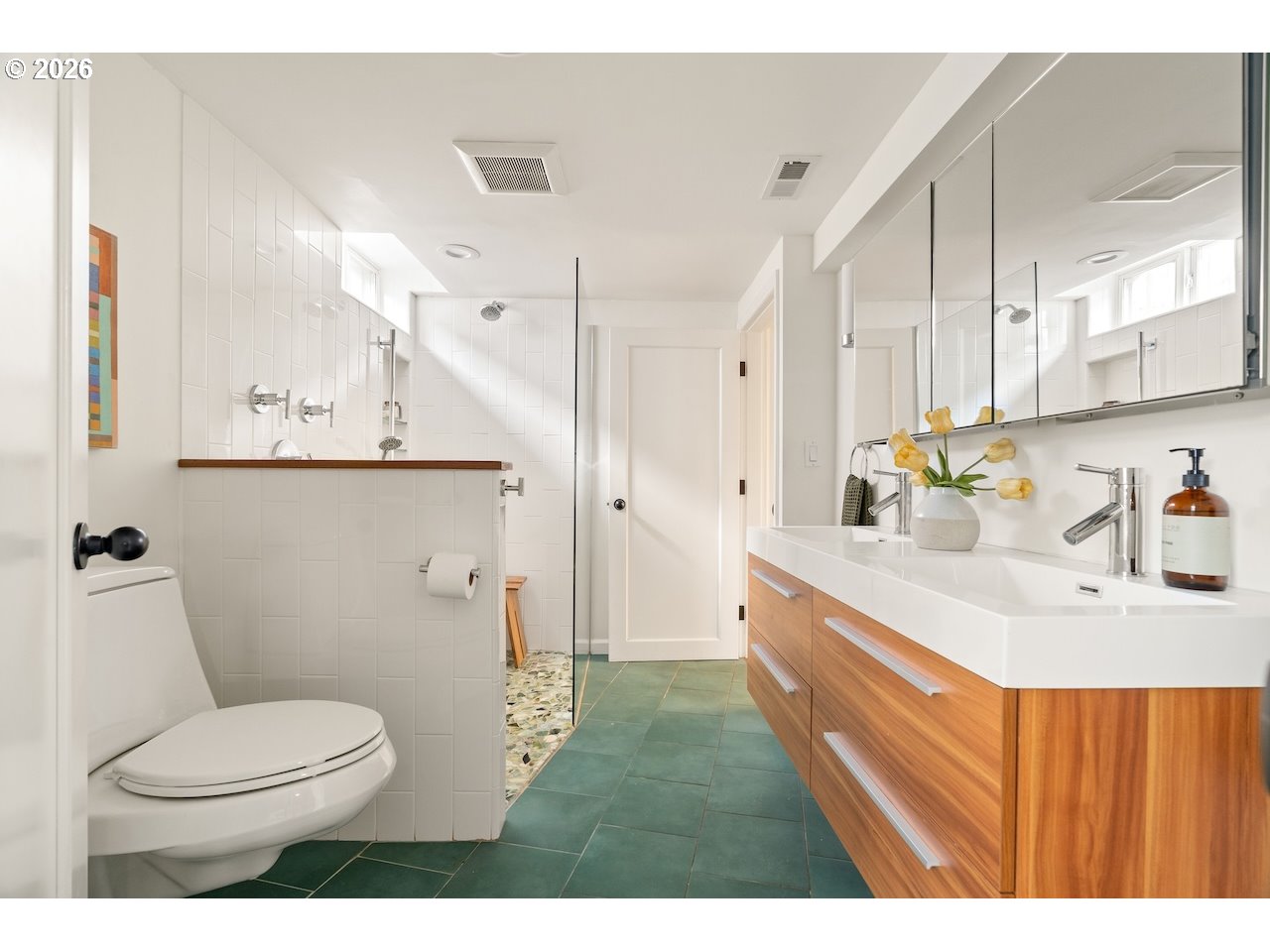 1606 North Alberta Street Portland, OR 97217 - Photo 29 of 46 a bathroom with a sink a toilet and a mirror