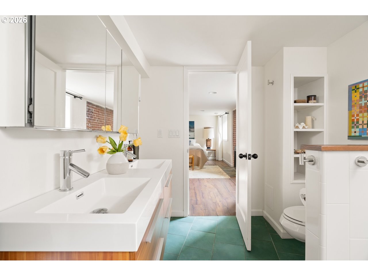 1606 North Alberta Street Portland, OR 97217 - Photo 32 of 46 a bathroom with a sink a toilet and a mirror