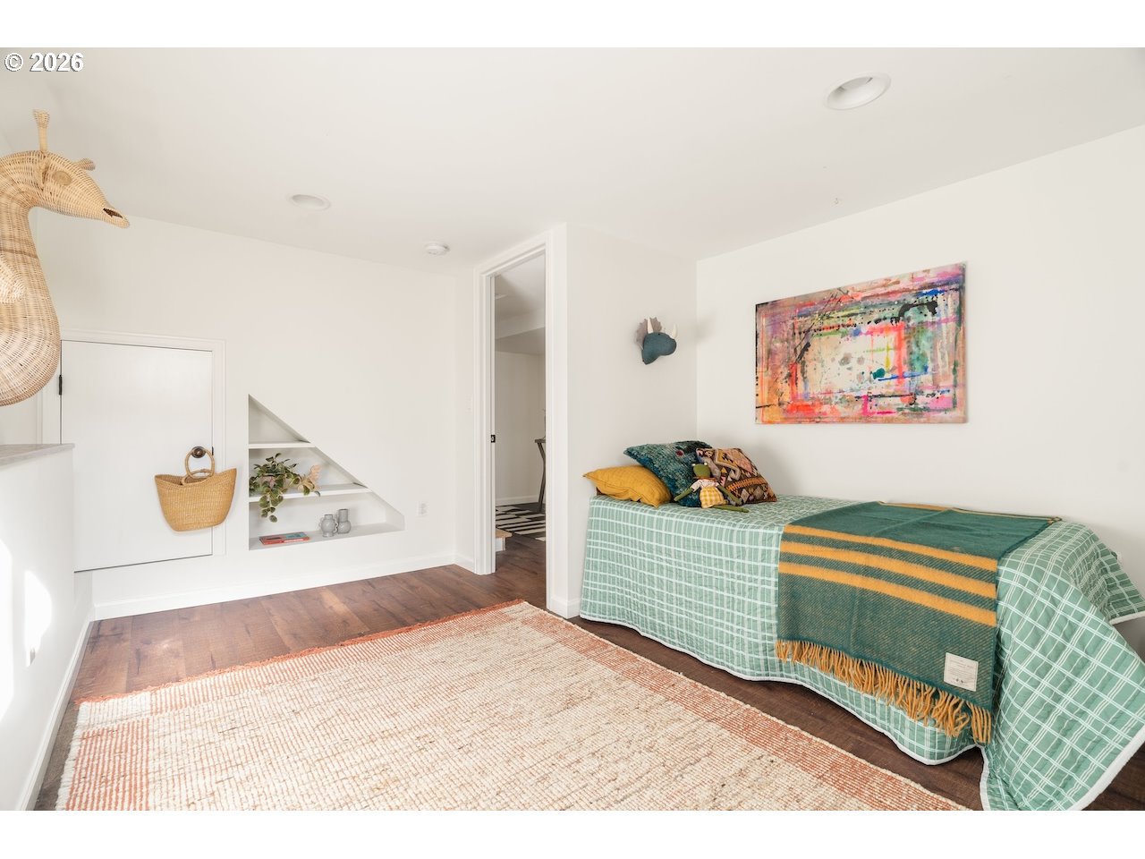 1606 North Alberta Street Portland, OR 97217 - Photo 36 of 46 a bedroom with a bed and a cabinets