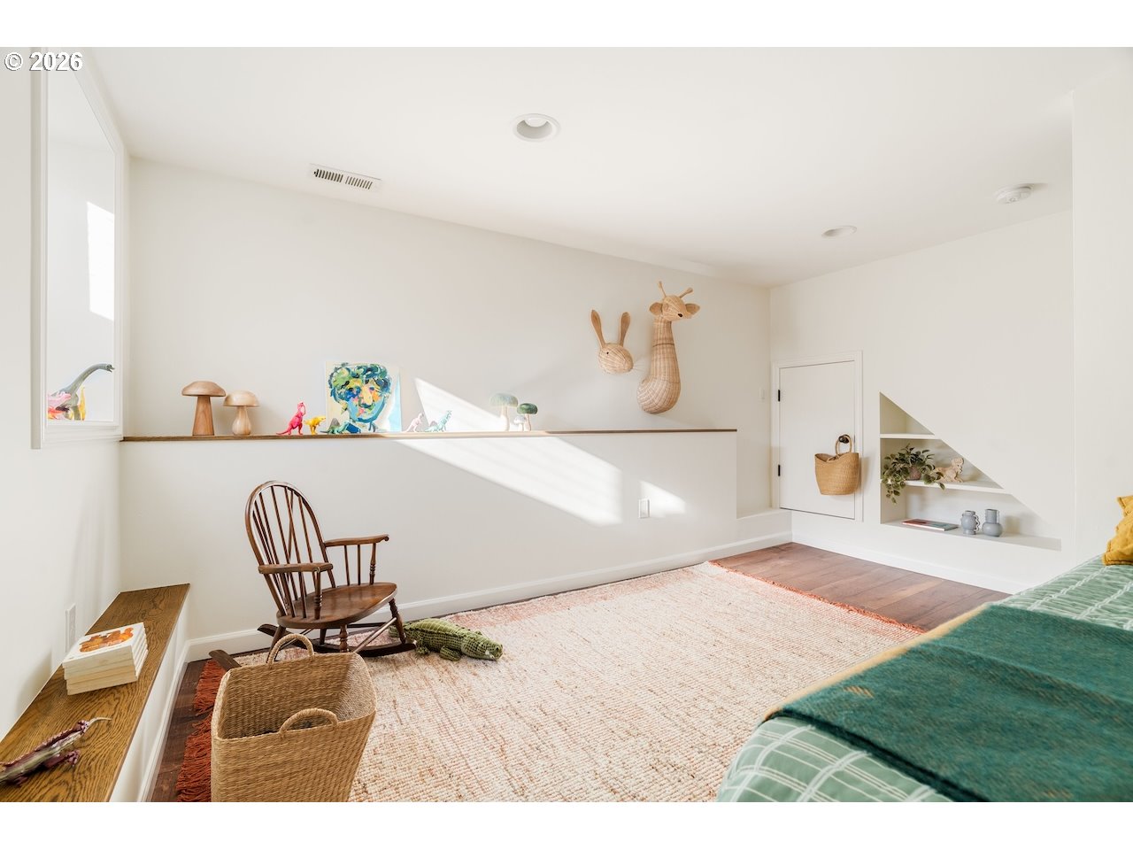 1606 North Alberta Street Portland, OR 97217 - Photo 37 of 46 a bedroom with a bed and a chair