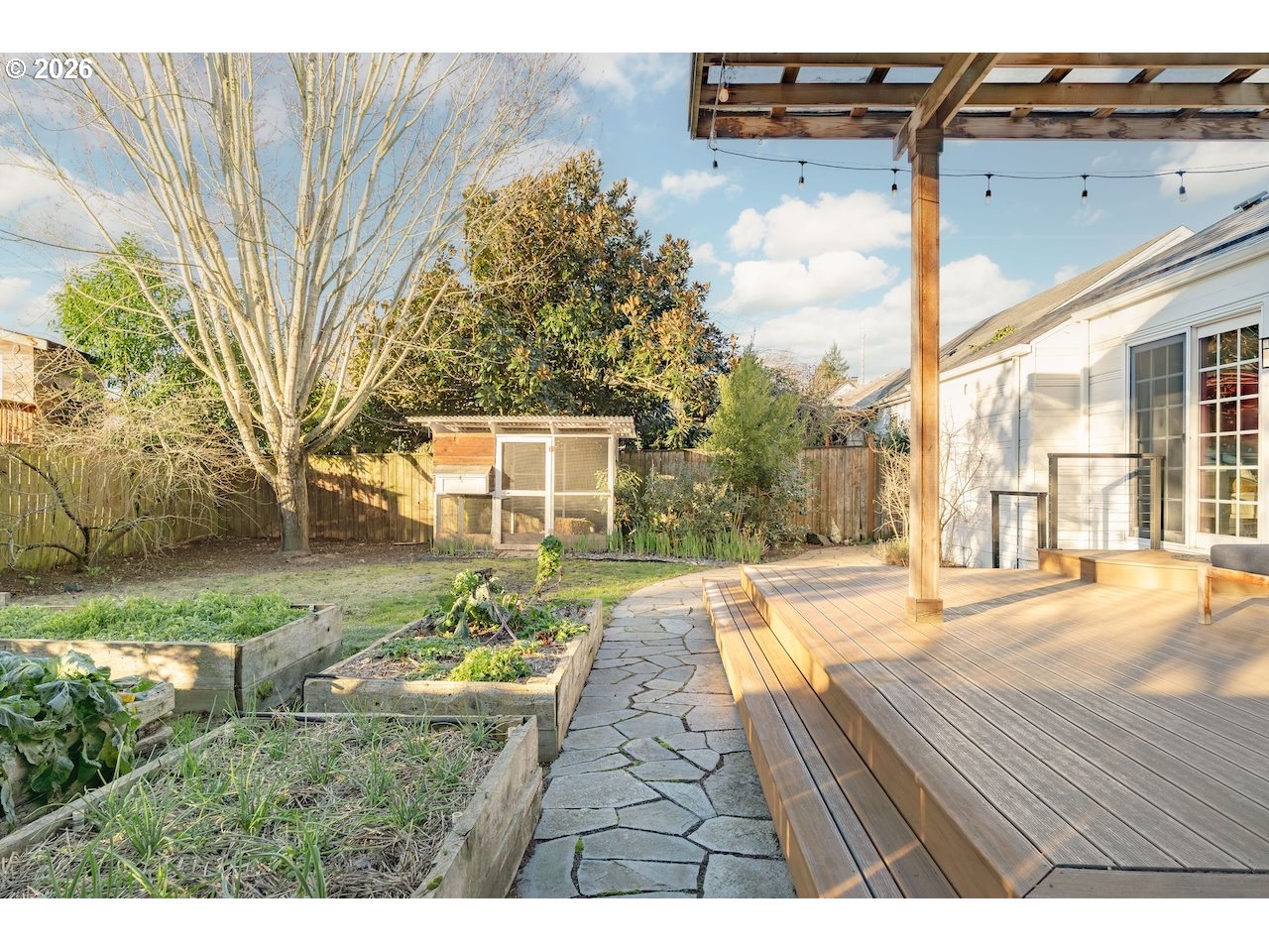 1606 North Alberta Street Portland, OR 97217 - Photo 44 of 46 a view of a house with a yard
