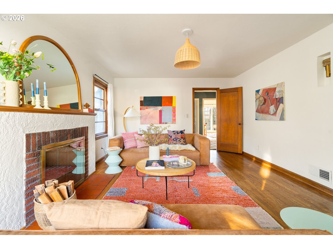 1606 North Alberta Street Portland, OR 97217 - Photo 5 of 46 a living room with furniture a fireplace and a large window