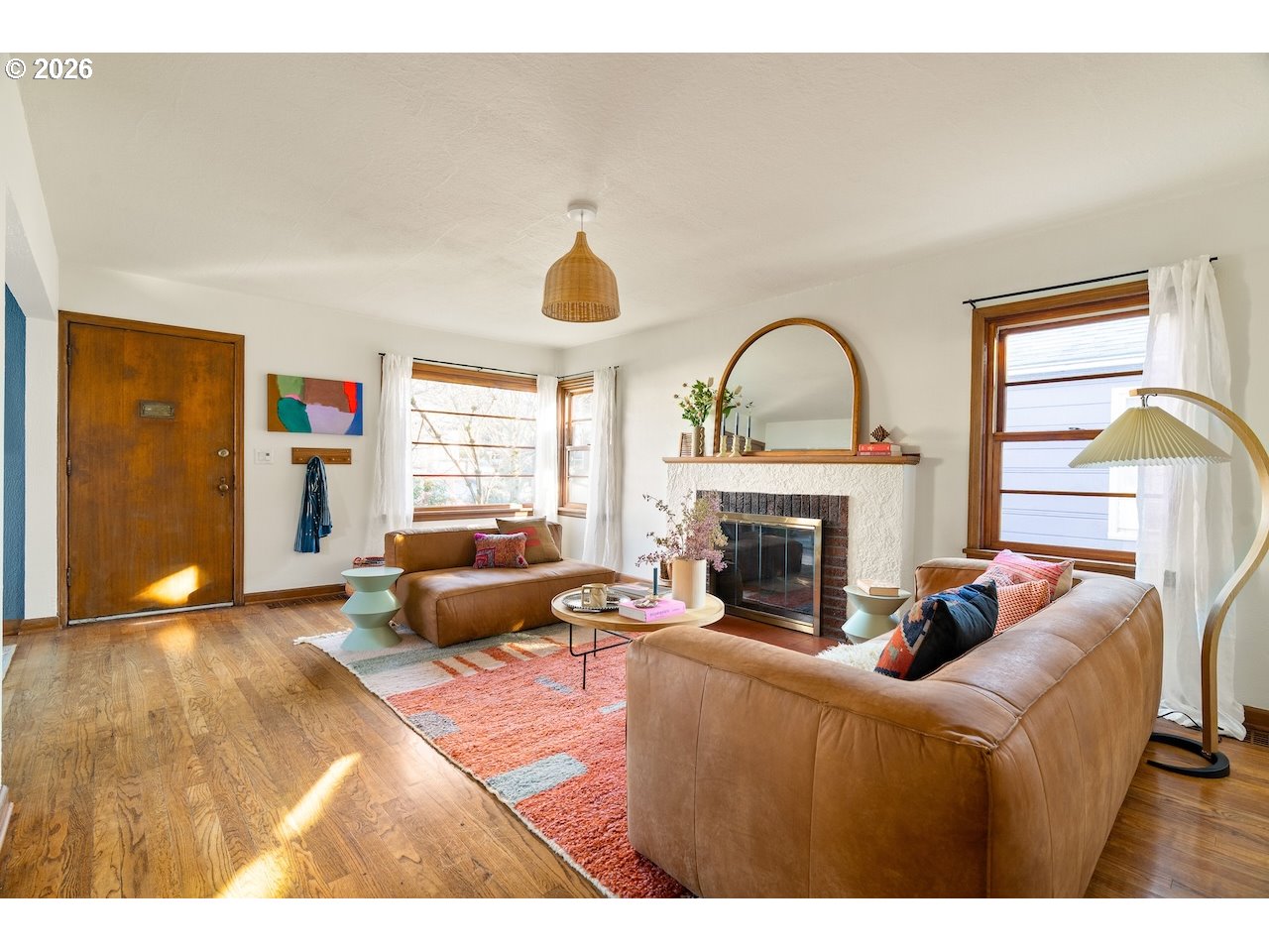 1606 North Alberta Street Portland, OR 97217 - Photo 6 of 46 a living room with furniture and a fireplace