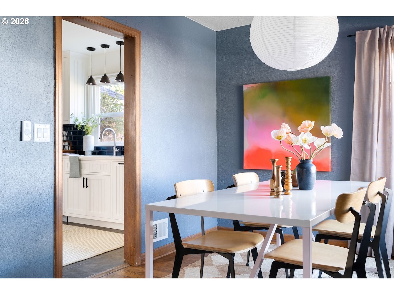 1606 North Alberta Street Portland, OR 97217 - Photo 8 of 46 a dining room with furniture a rug and a chandelier