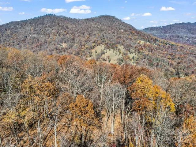a view of mountains and valleys