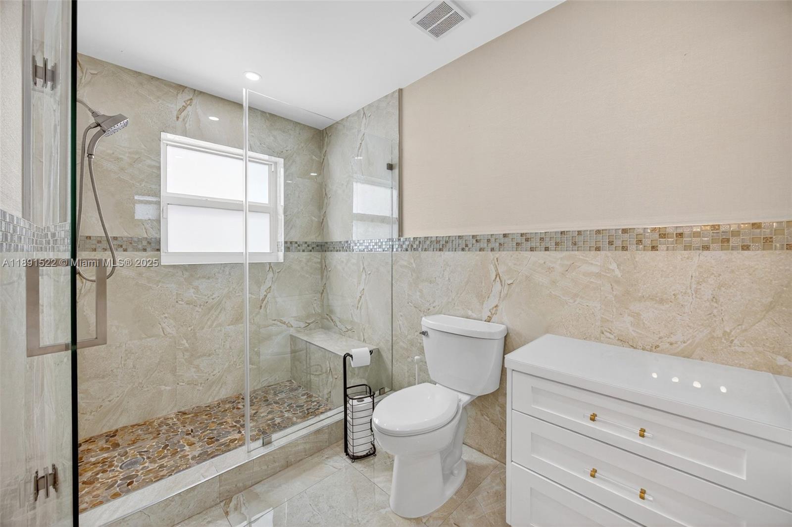 13280 Southwest 39th Terrace Miami, FL 33175 - Photo 18 of 57 a bathroom with a toilet shower vanity and a sink