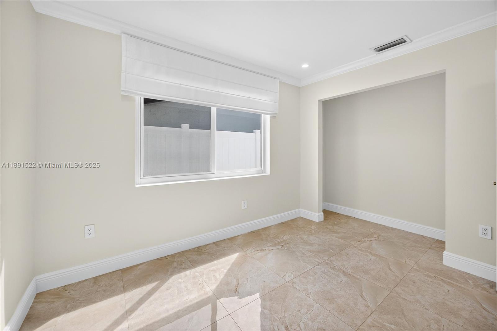 13280 Southwest 39th Terrace Miami, FL 33175 - Photo 27 of 57 a view of an empty room with a window