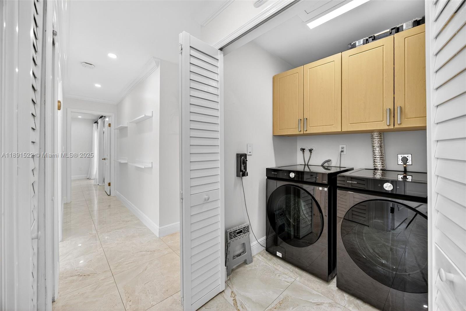 13280 Southwest 39th Terrace Miami, FL 33175 - Photo 35 of 57 a utility room with sink dryer and washer