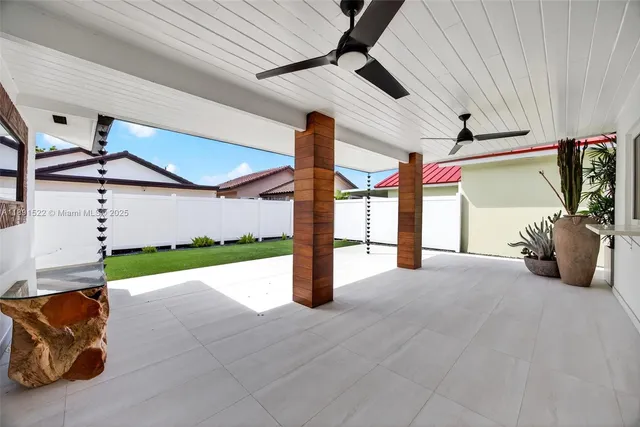 a house view with a backyard space