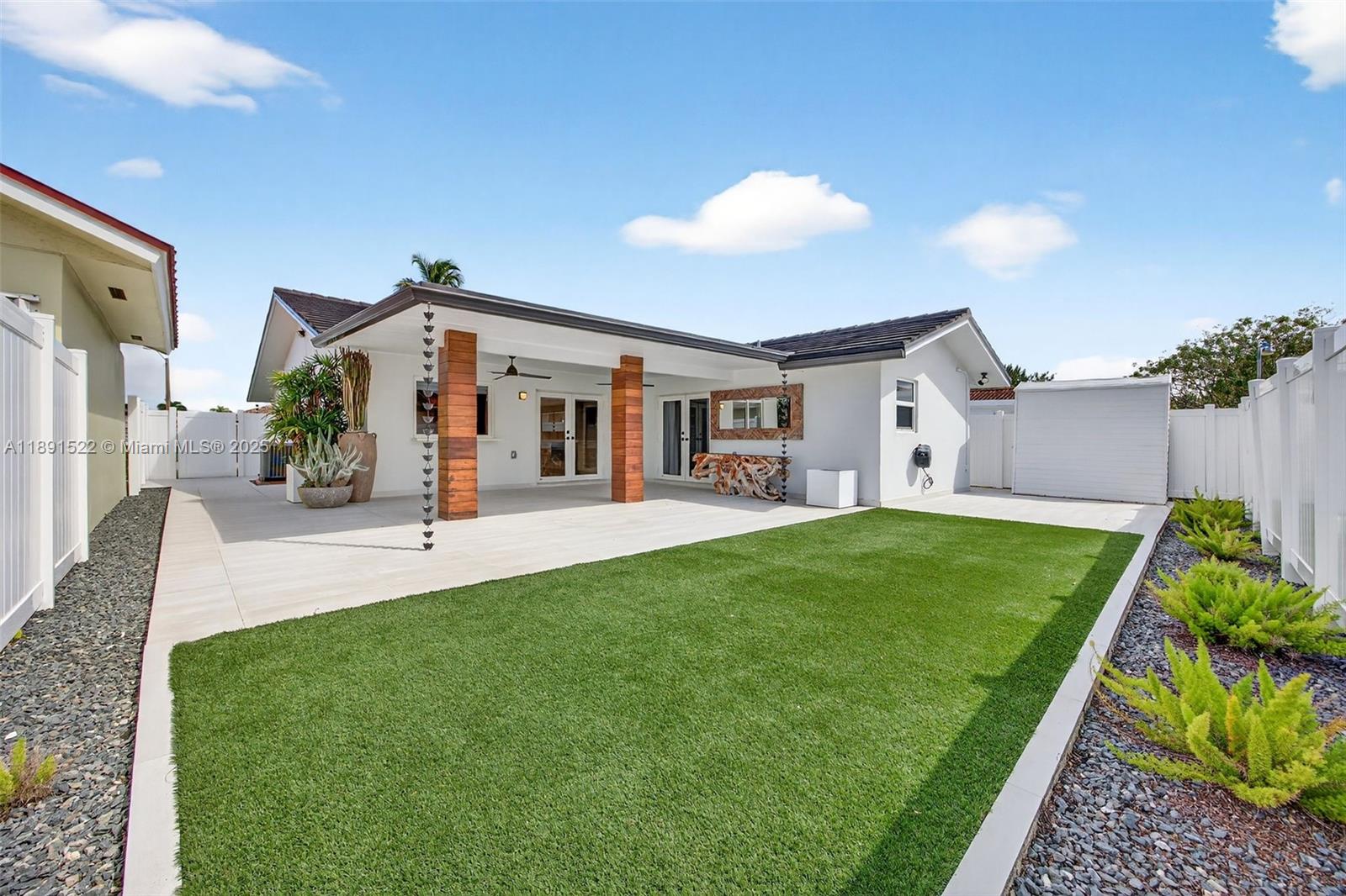13280 Southwest 39th Terrace Miami, FL 33175 - Photo 39 of 57 a view of a backyard with furniture