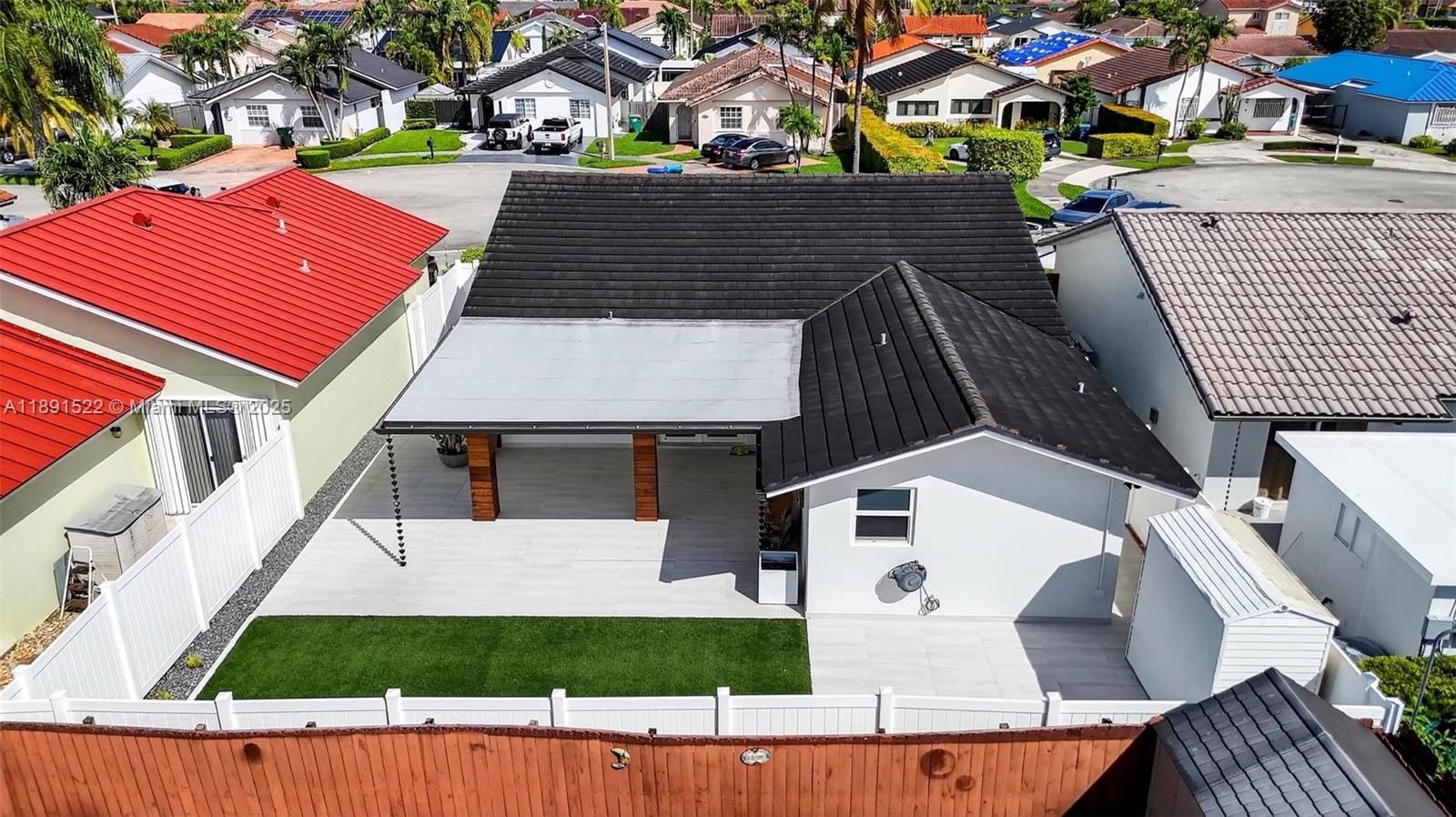13280 Southwest 39th Terrace Miami, FL 33175 - Photo 49 of 57 a aerial view of a house with a yard