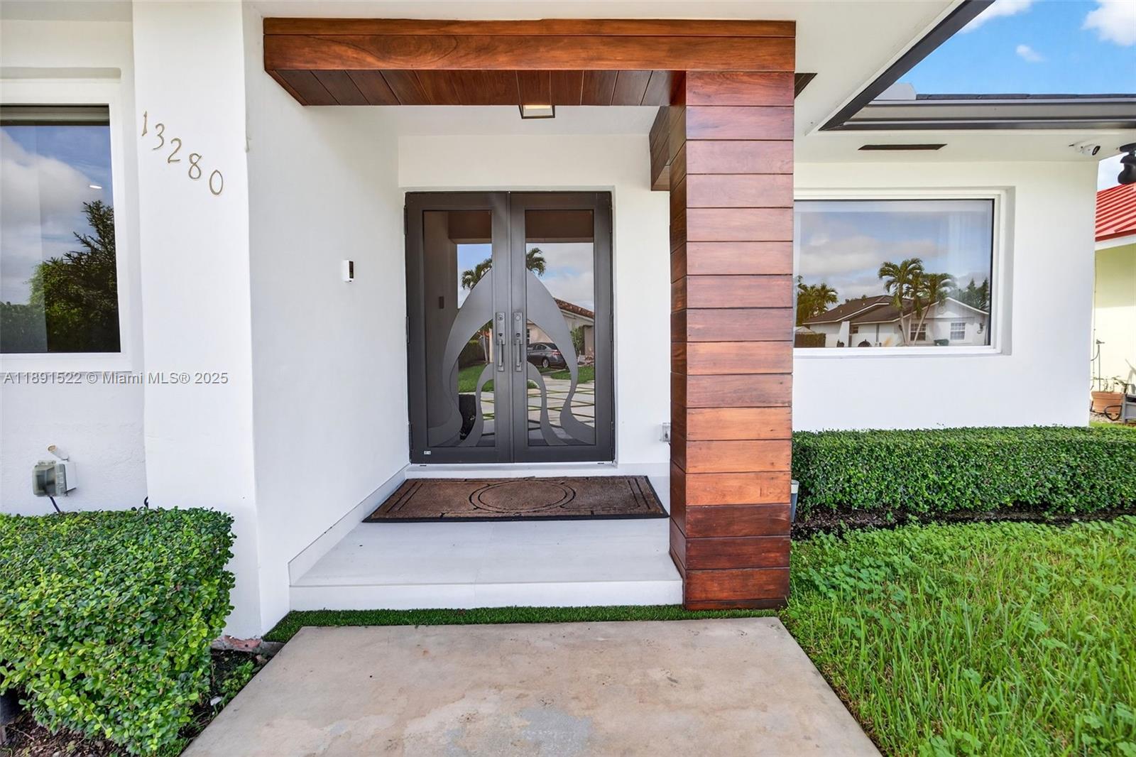 13280 Southwest 39th Terrace Miami, FL 33175 - Photo 5 of 57 a front view of a house with a yard