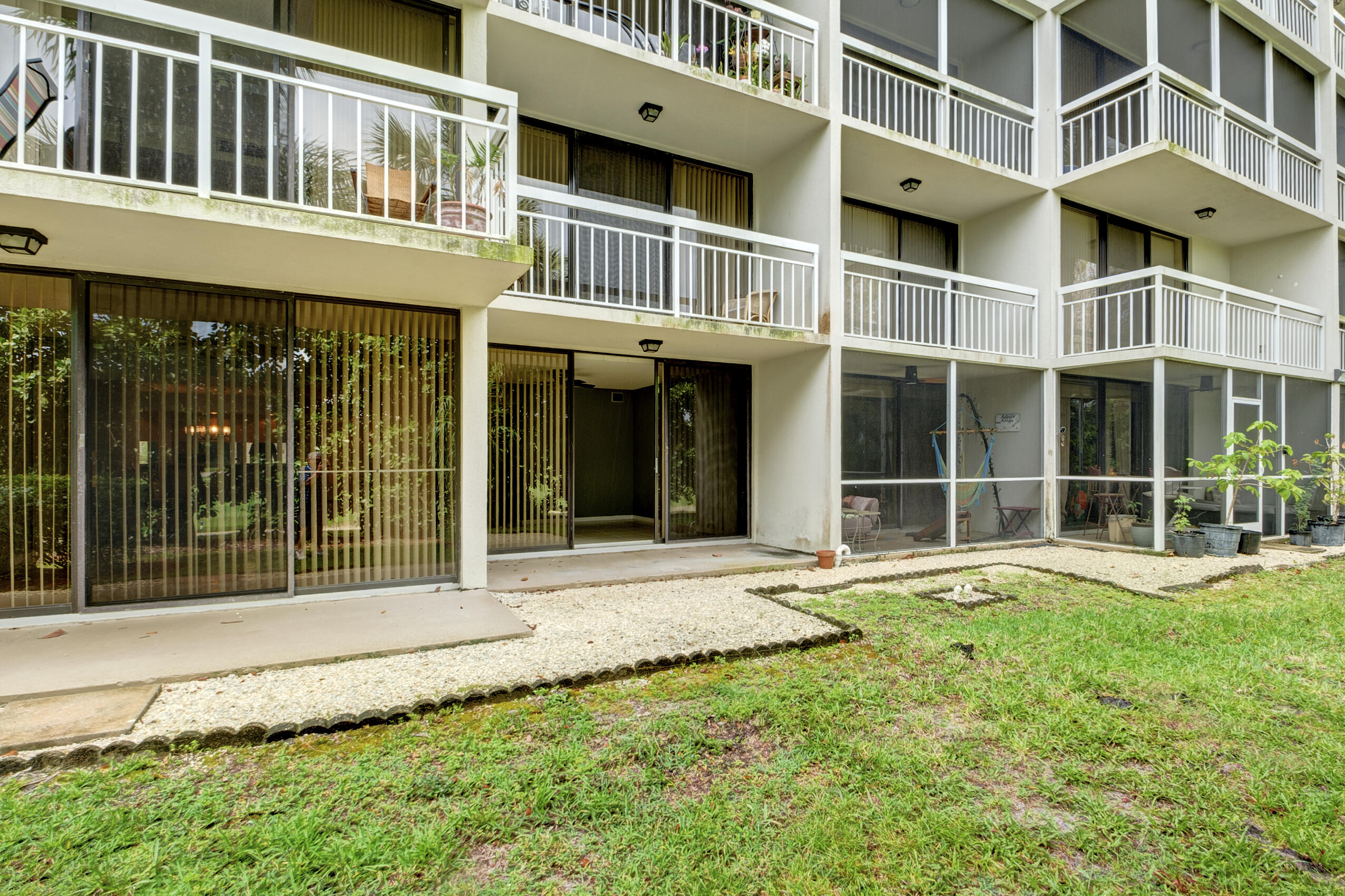 6145 Balboa Circle, Unit 103 Boca Raton, FL 33433 - Photo 26 of 31 a view of a building with a window and many windows