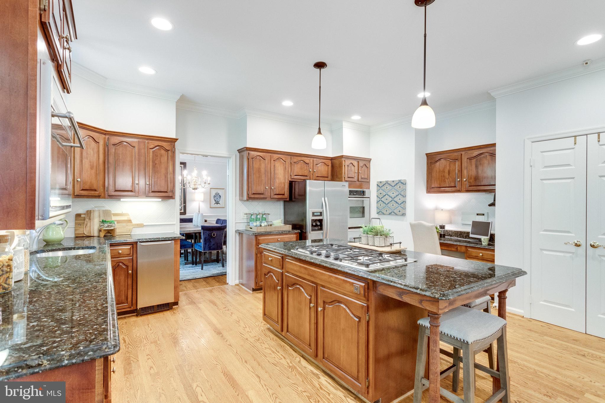 1120 Old Cedar Road McLean, VA 22102 - Photo 10 of 49 Pendent Lights over Island, Built-in Desk Area