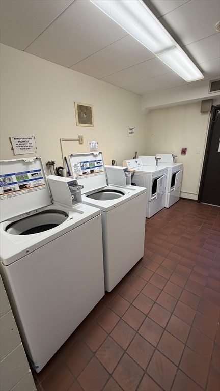 150 Lewis Street, Unit 302 Lynn, MA 01902 - Photo 12 of 18 a living room with furniture and a table