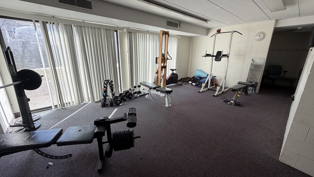 150 Lewis Street, Unit 302 Lynn, MA 01902 - Photo 13 of 18 a view of a room with gym equipment