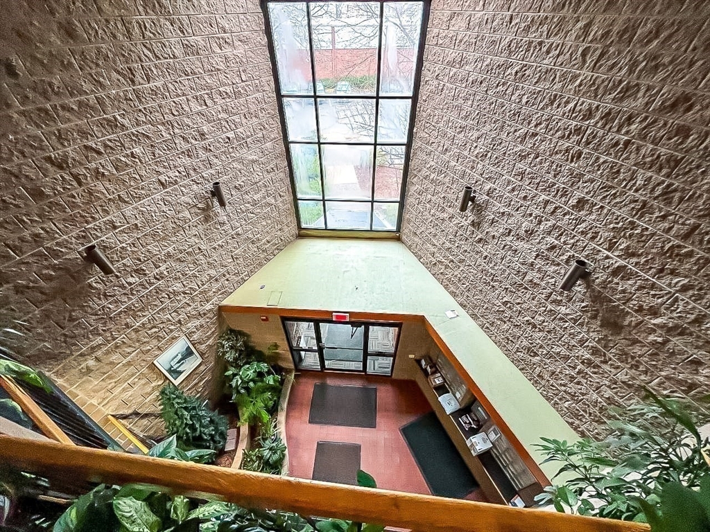 150 Lewis Street, Unit 302 Lynn, MA 01902 - Photo 17 of 18 wooden floor with a outdoor view