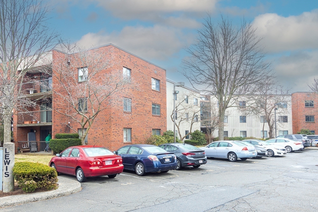 150 Lewis Street, Unit 302 Lynn, MA 01902 - Photo 18 of 18 a cars parked in front of a building