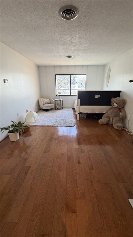 150 Lewis Street, Unit 302 Lynn, MA 01902 - Photo 5 of 18 a living room with furniture and a table