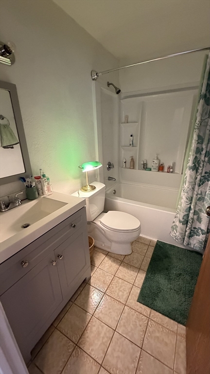 150 Lewis Street, Unit 302 Lynn, MA 01902 - Photo 7 of 18 a bathroom with a sink a toilet and a bathtub