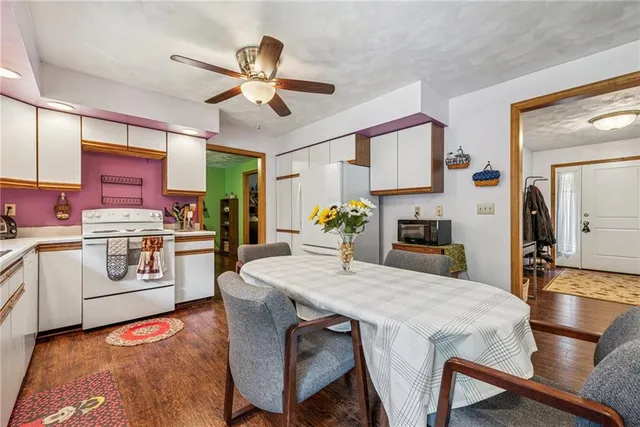 a view of a chairs on the roof deck