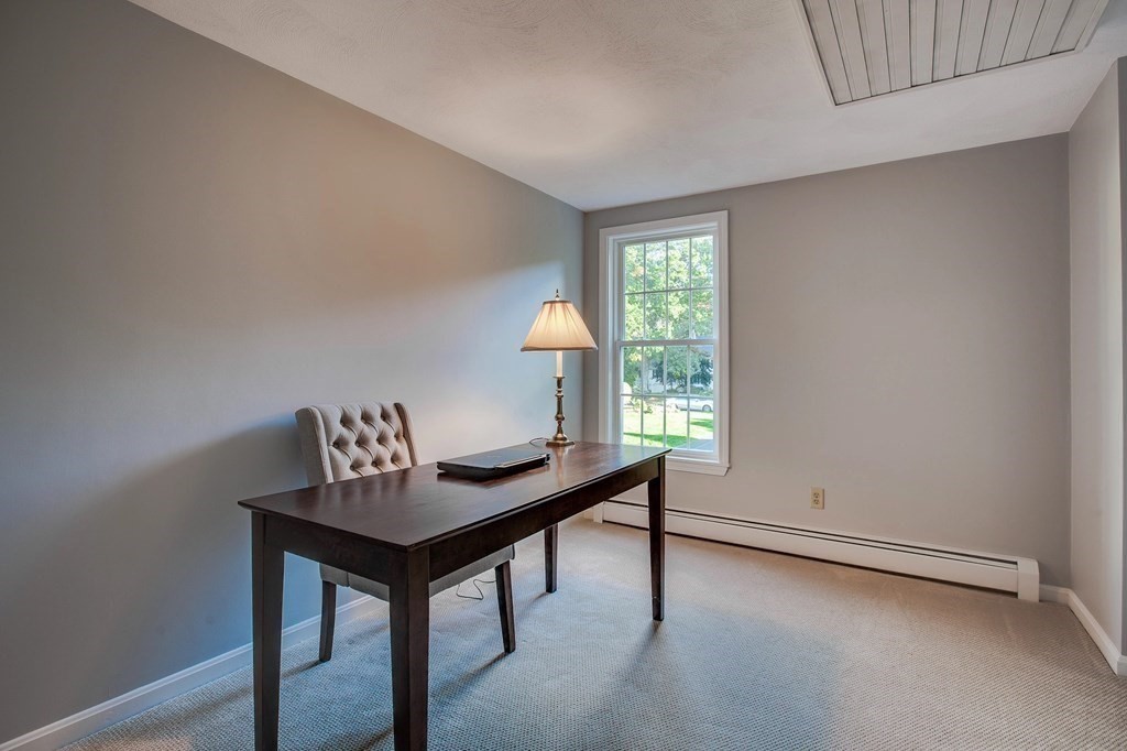 6 Peach Tree Path Andover, MA 01810 - Photo 18 of 33 a room with furniture and a window
