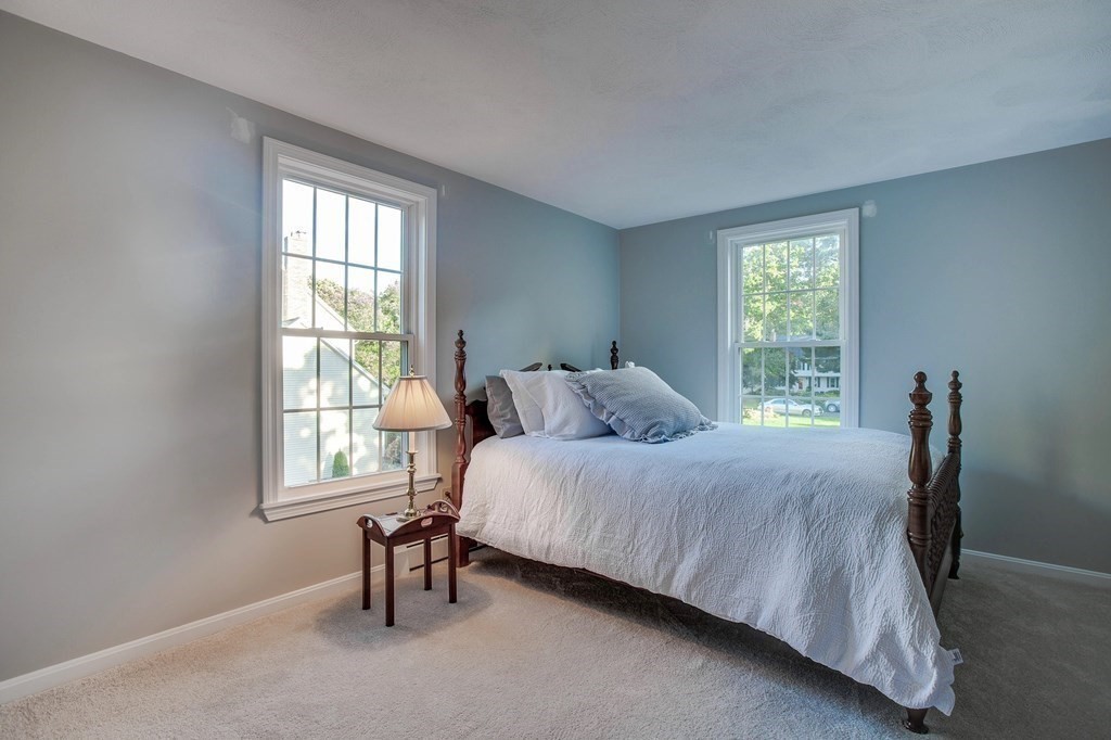 6 Peach Tree Path Andover, MA 01810 - Photo 19 of 33 a bedroom with a bed next to a window