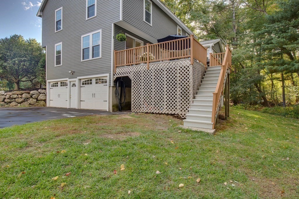 6 Peach Tree Path Andover, MA 01810 - Photo 27 of 33 a view of a house with a yard