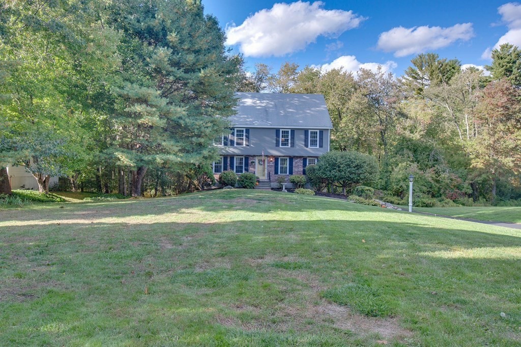 6 Peach Tree Path Andover, MA 01810 - Photo 30 of 33 a view of a big house with a big yard and large trees