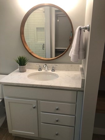 6 Peach Tree Path Andover, MA 01810 - Photo 33 of 33 a bathroom with a sink and a mirror