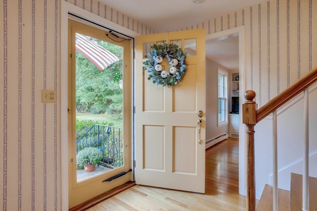 6 Peach Tree Path Andover, MA 01810 - Photo 4 of 33 a view of entryway with wooden floor and stairs
