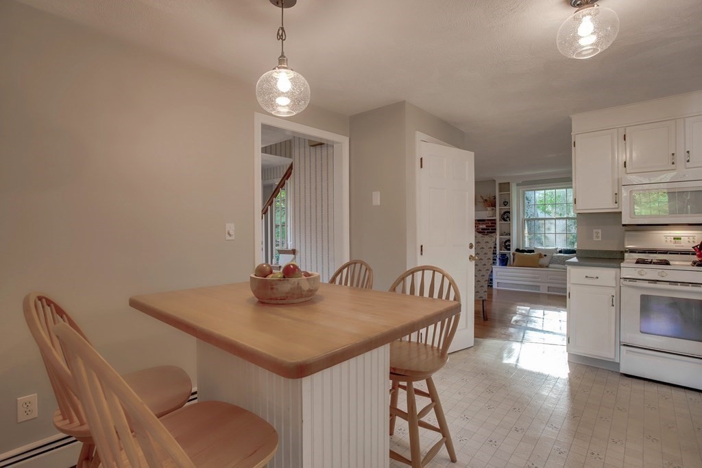 6 Peach Tree Path Andover, MA 01810 - Photo 8 of 33 a kitchen with sink cabinets and stove