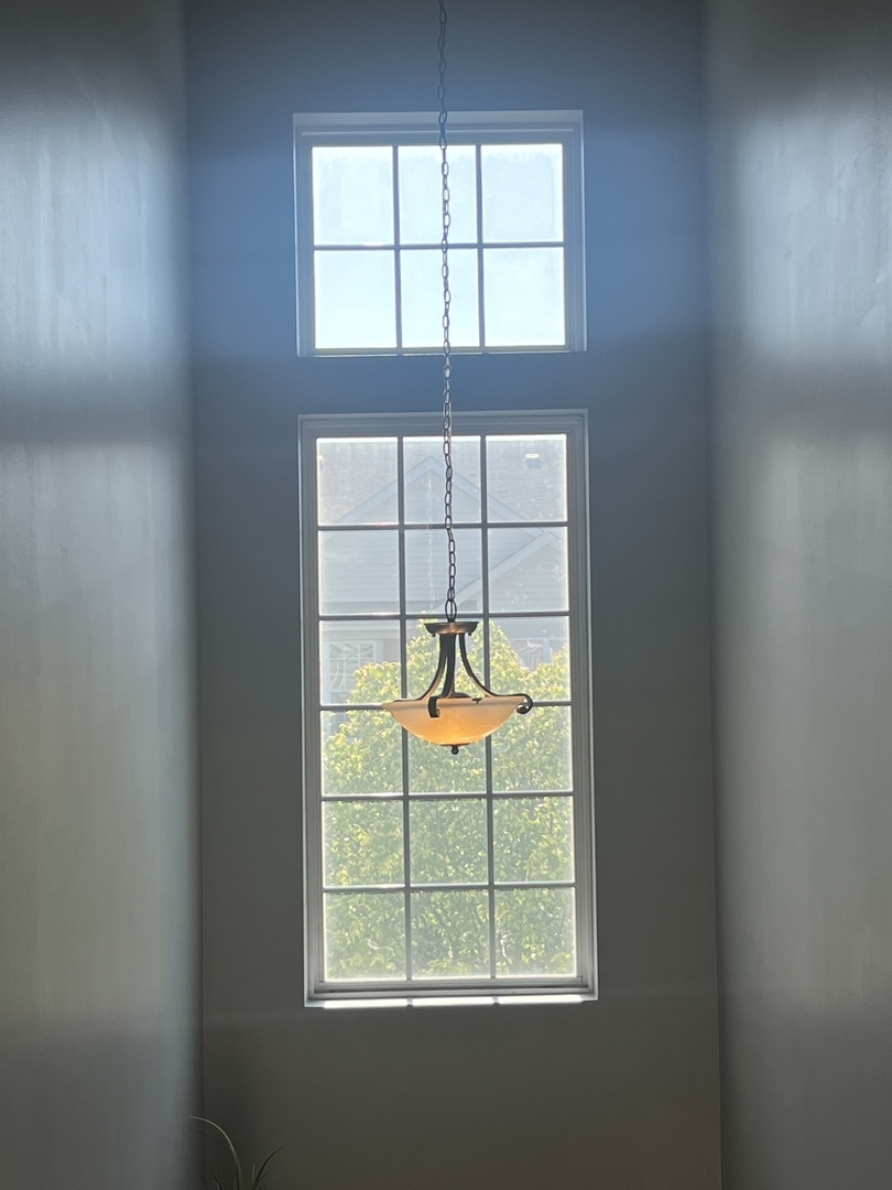 10205 Mulberry Lane, Unit J Bridgeview, IL 60455 - Photo 10 of 12 an empty room with window