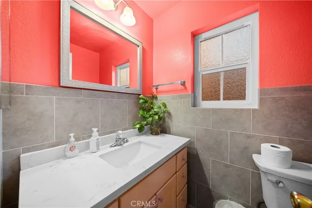 a bathroom with a sink and a toilet