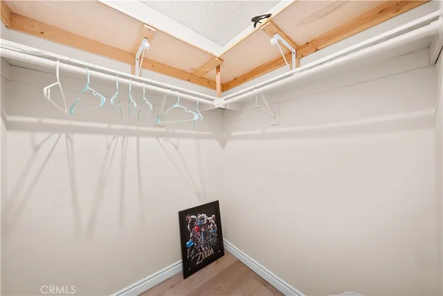 a view of a hallway with stairs