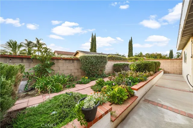 a view of a garden with a lake
