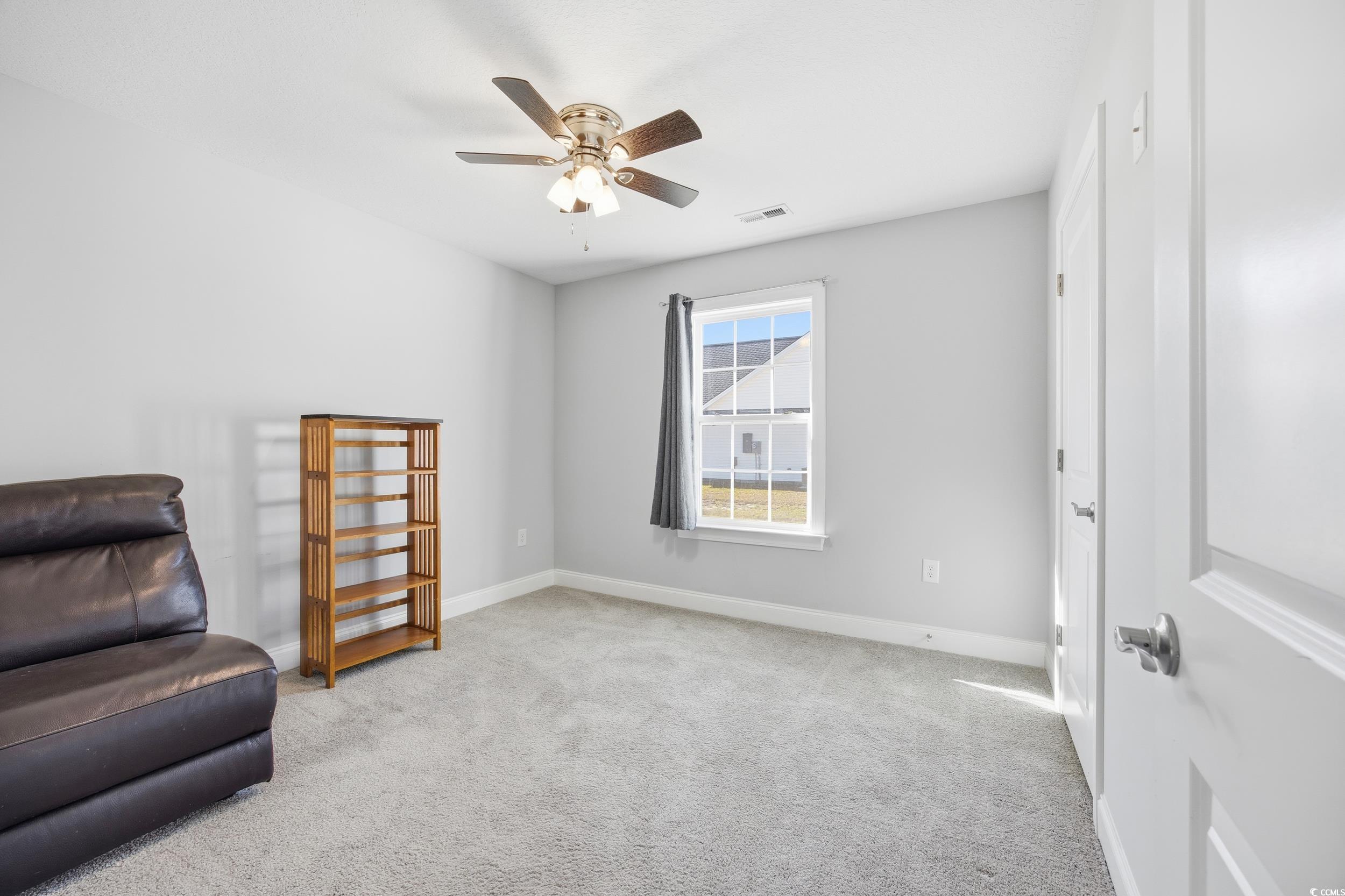 2295 Vaught Road Galivants Ferry, SC 29544 - Photo 13 of 26 Sitting room featuring light carpet and ceiling fan