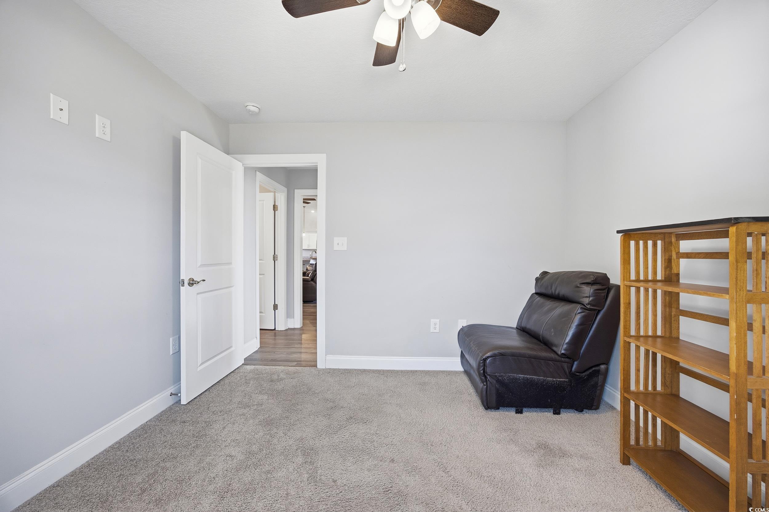 2295 Vaught Road Galivants Ferry, SC 29544 - Photo 14 of 26 Sitting room featuring light colored carpet and a ceiling fan
