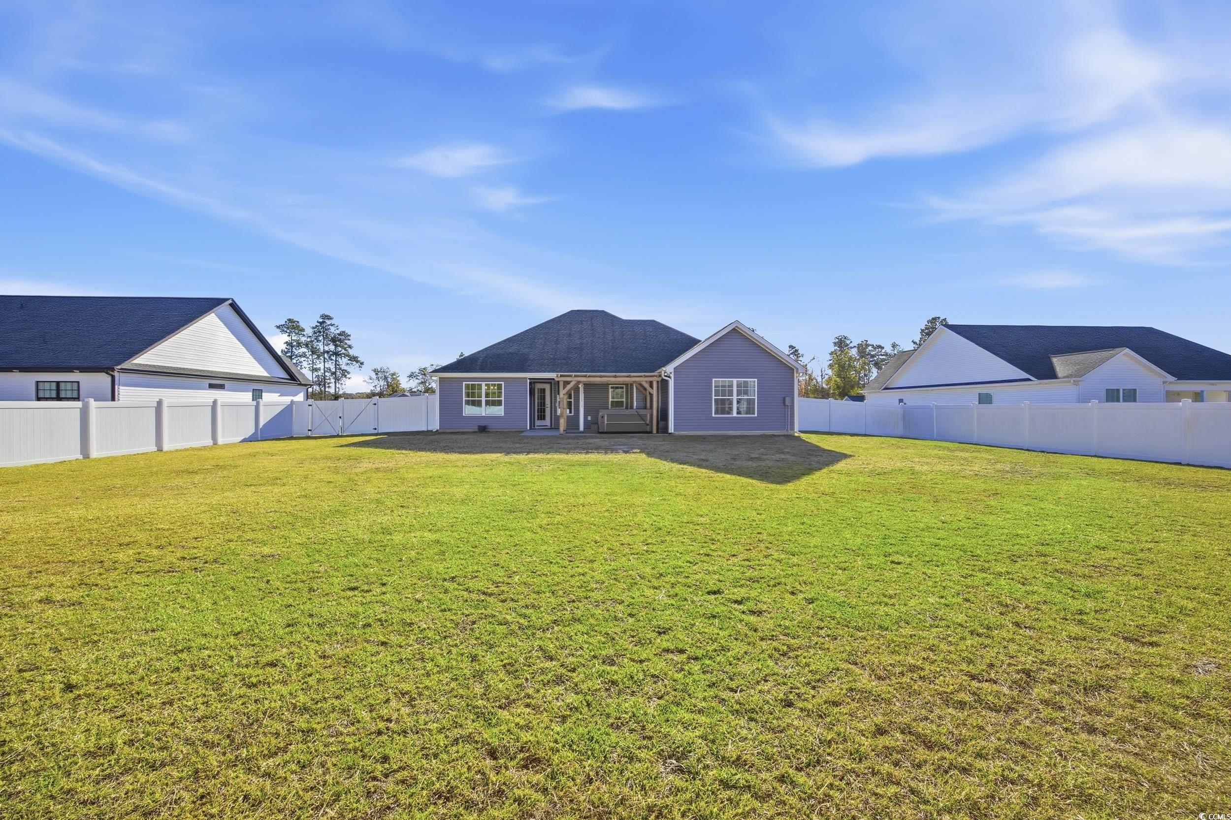 2295 Vaught Road Galivants Ferry, SC 29544 - Photo 22 of 26 Back of property with a fenced backyard