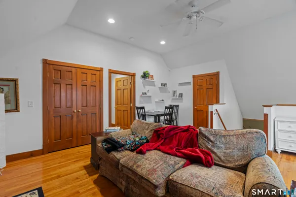 a living room with furniture and a window