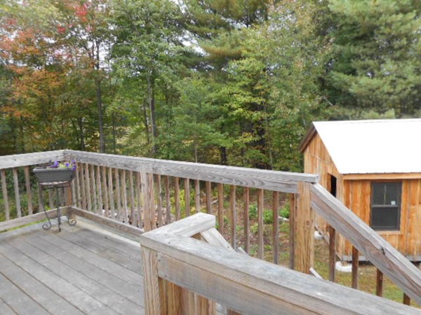 9 Murphy Road North Brookfield, MA 01535 - Photo 25 of 25 a view of a balcony with wooden floor and fence