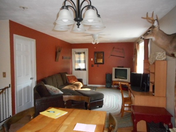 9 Murphy Road North Brookfield, MA 01535 - Photo 4 of 25 a living room with furniture and a flat screen tv
