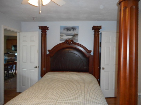 9 Murphy Road North Brookfield, MA 01535 - Photo 6 of 25 a bedroom with a bed and wooden floor