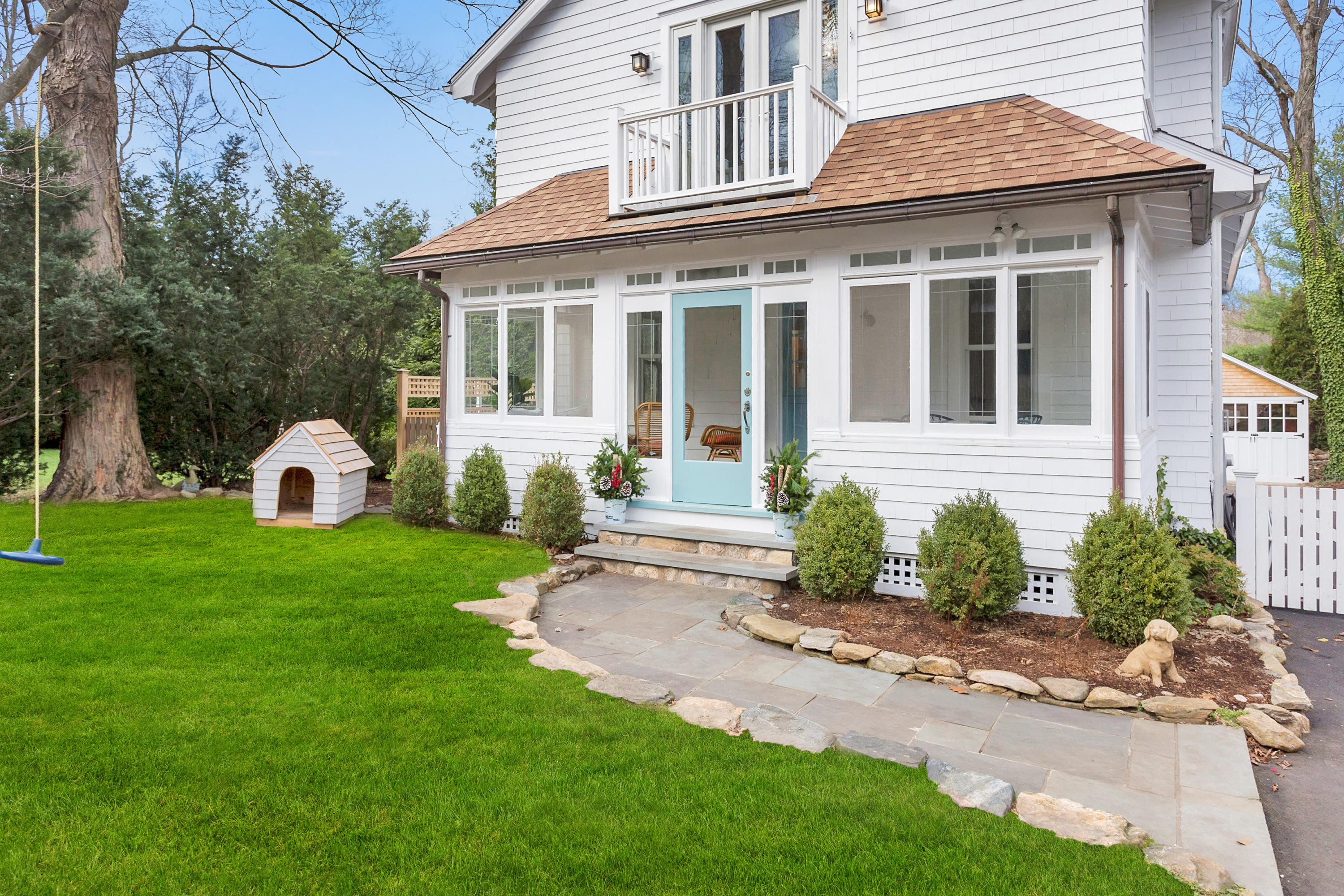 227 Middlesex Road Darien, CT 06820 - Photo 2 of 30 a front view of a house with garden and porch