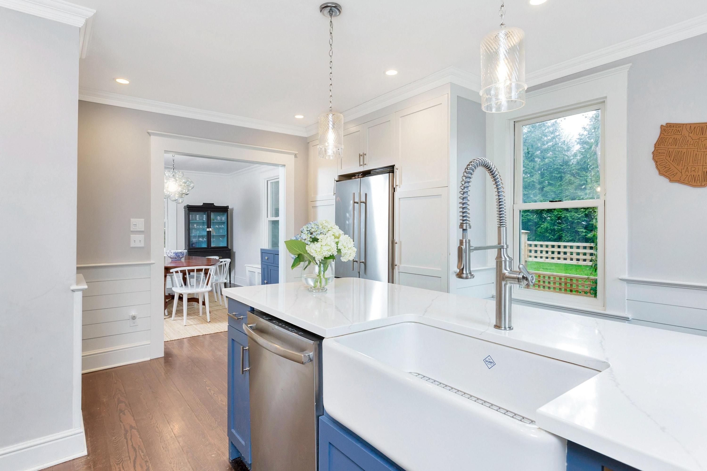227 Middlesex Road Darien, CT 06820 - Photo 12 of 30 a kitchen with stainless steel appliances granite countertop a sink a stove and a refrigerator