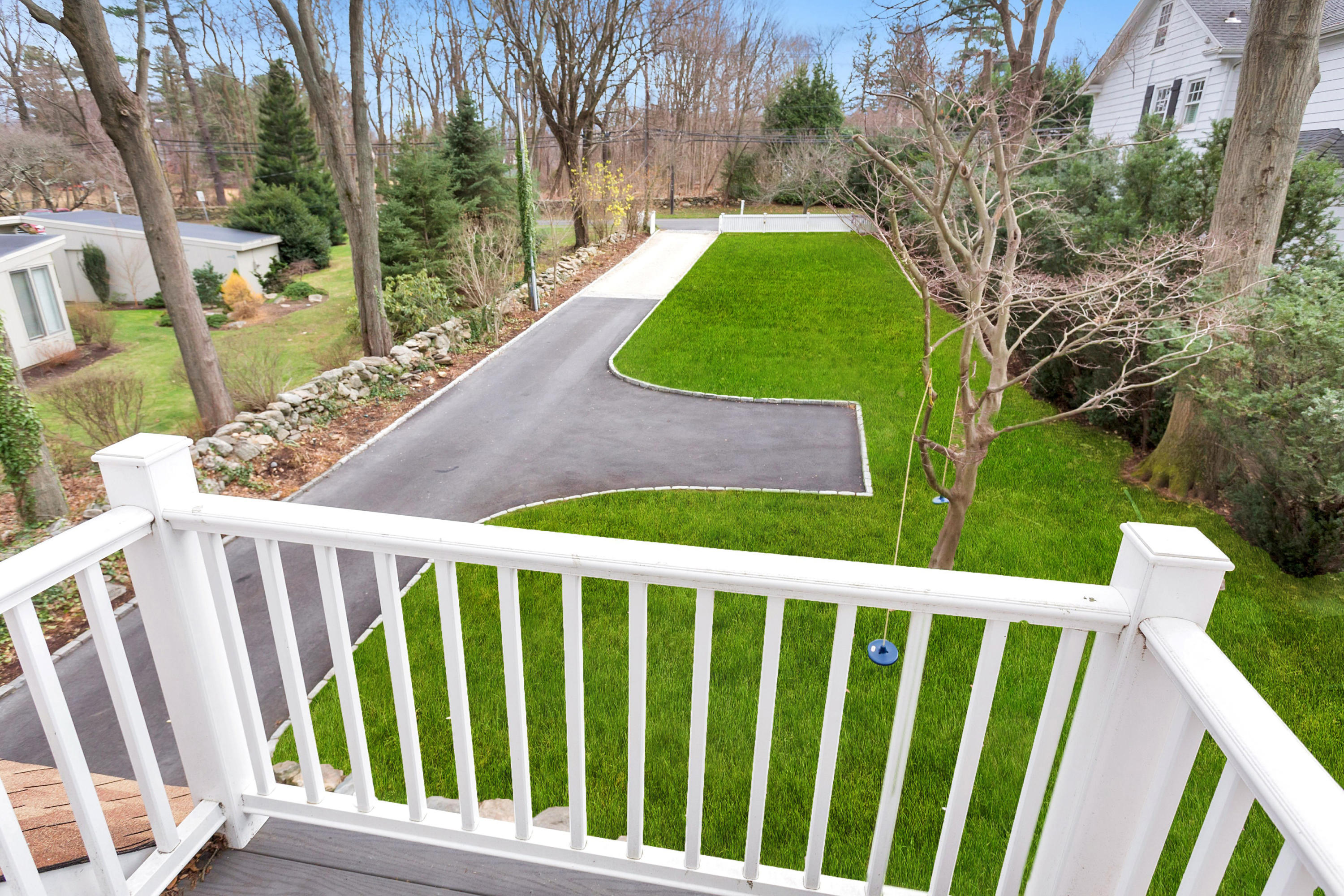 227 Middlesex Road Darien, CT 06820 - Photo 17 of 30 a view of a yard with plants
