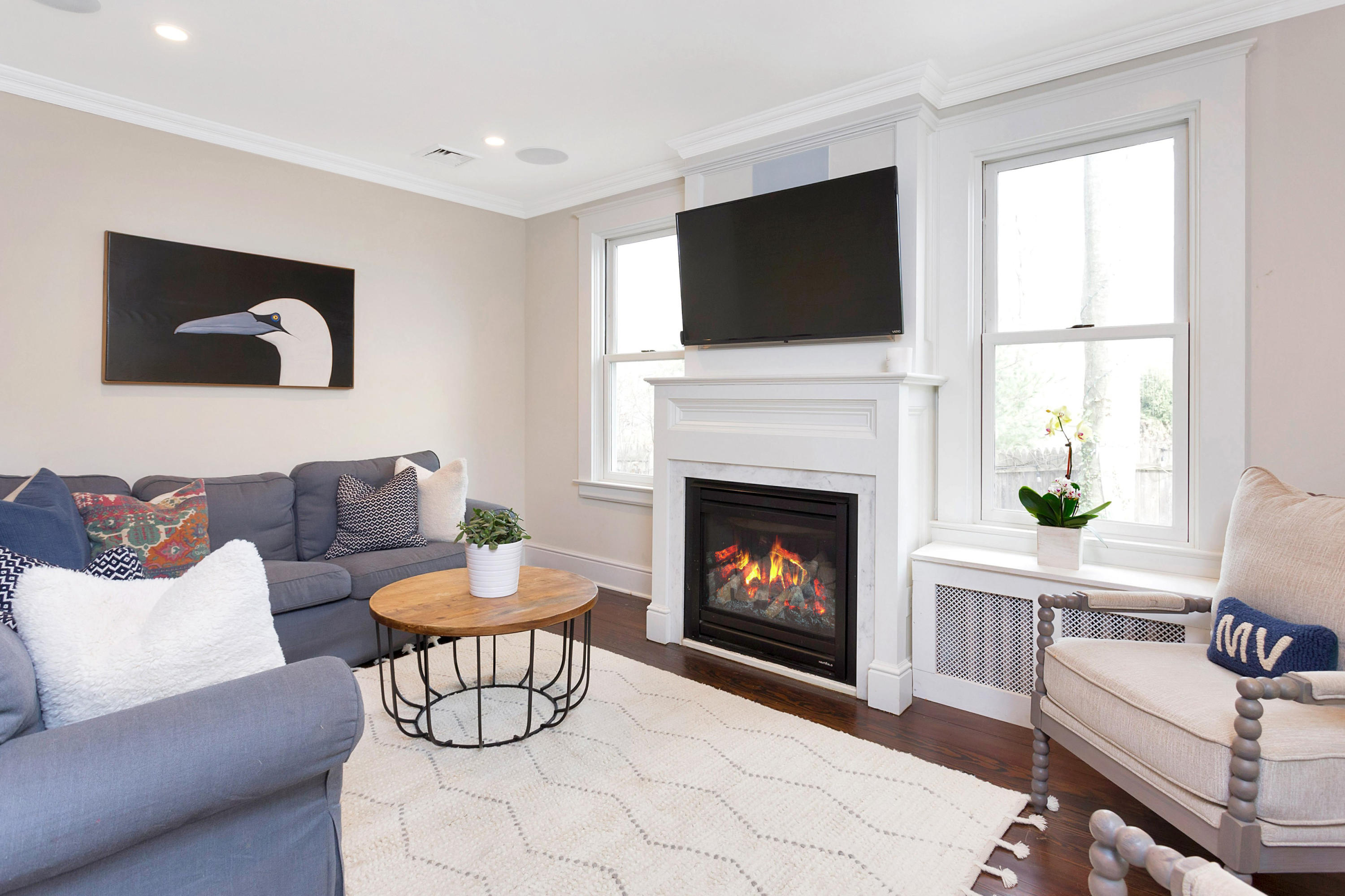 227 Middlesex Road Darien, CT 06820 - Photo 6 of 30 a living room with furniture a flat screen tv and a fireplace