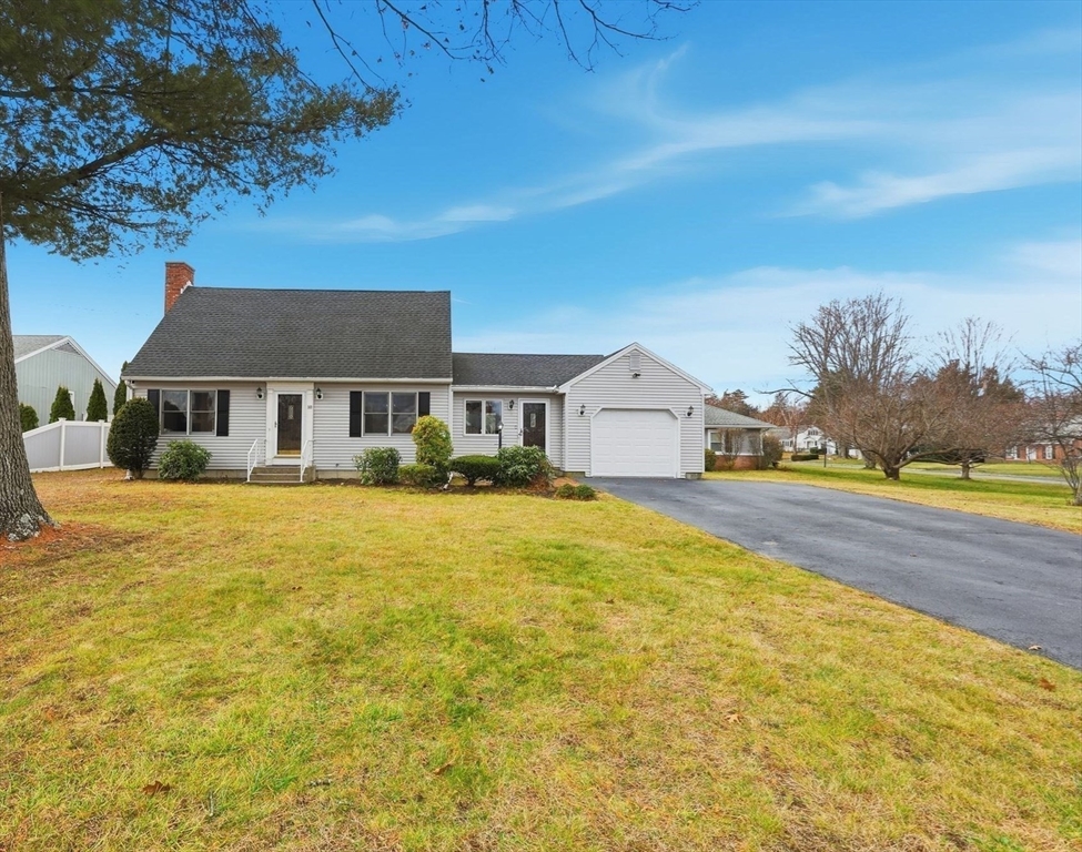 10 Woodcrest Road Springfield, MA 01129 - Photo 1 of 26 a front view of a house with a yard